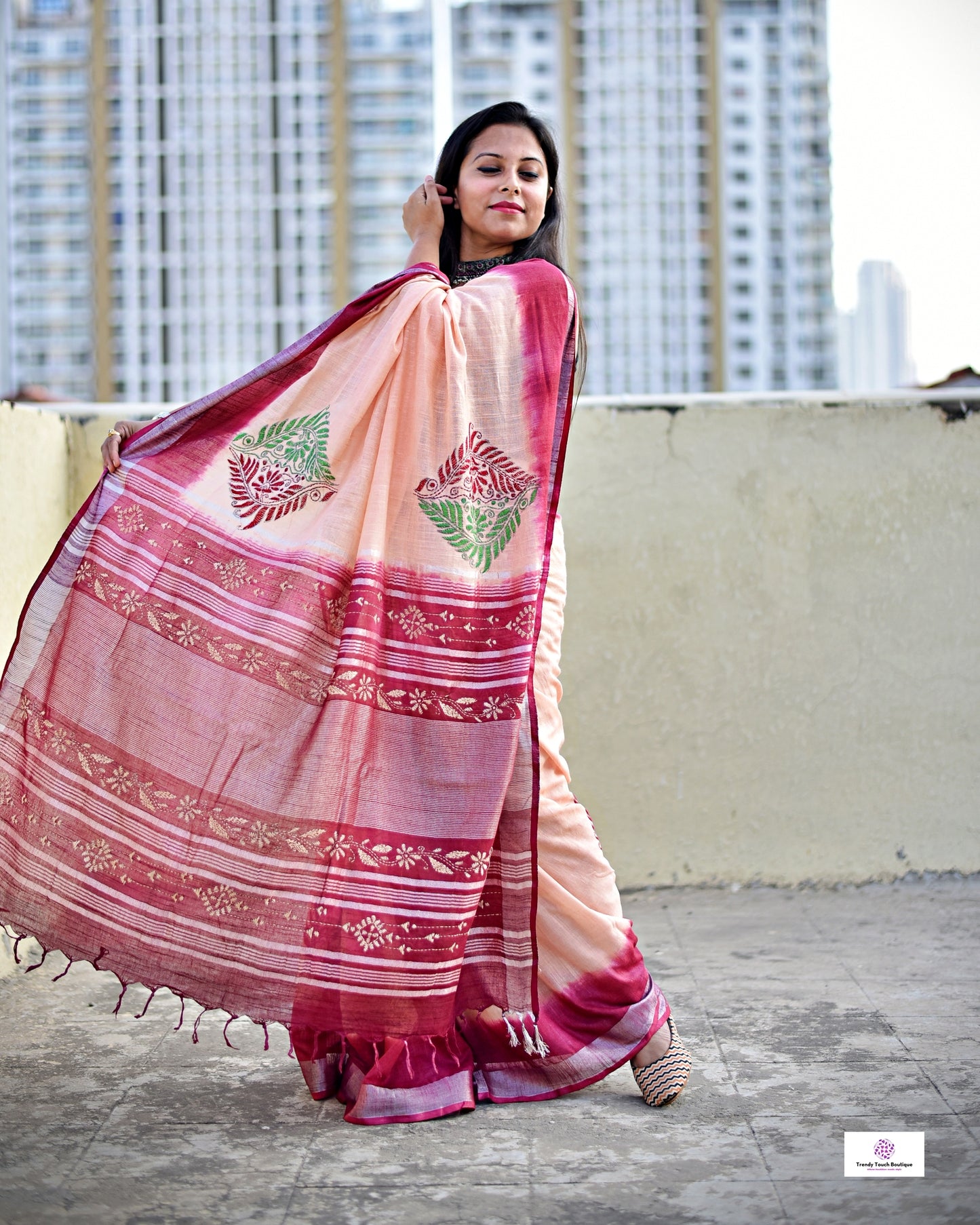 kantha handembroidery on a tie and dye maroon and chandan color linen with green and maroon thread. Best for office and casual styling with blouse piece and best price.