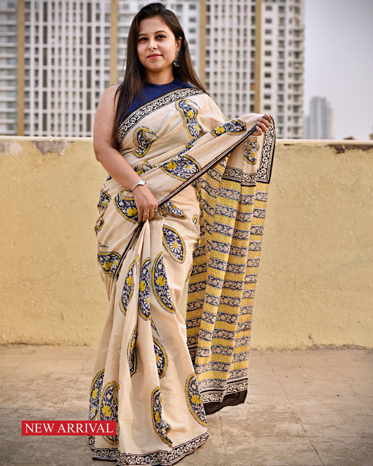 handblockprinted mulcotton in beige base with blue, yellow and black for office and casual styling summer best fabric saree with blouse piece and best price